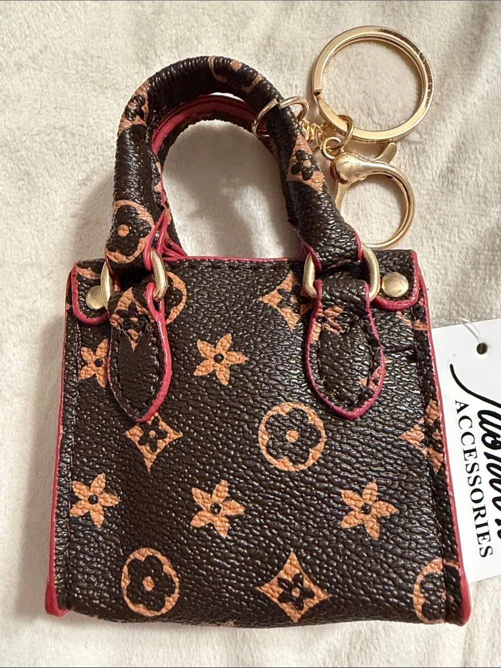 Mini Brown Monogram Keychain Bag with Pink Trim. (85)